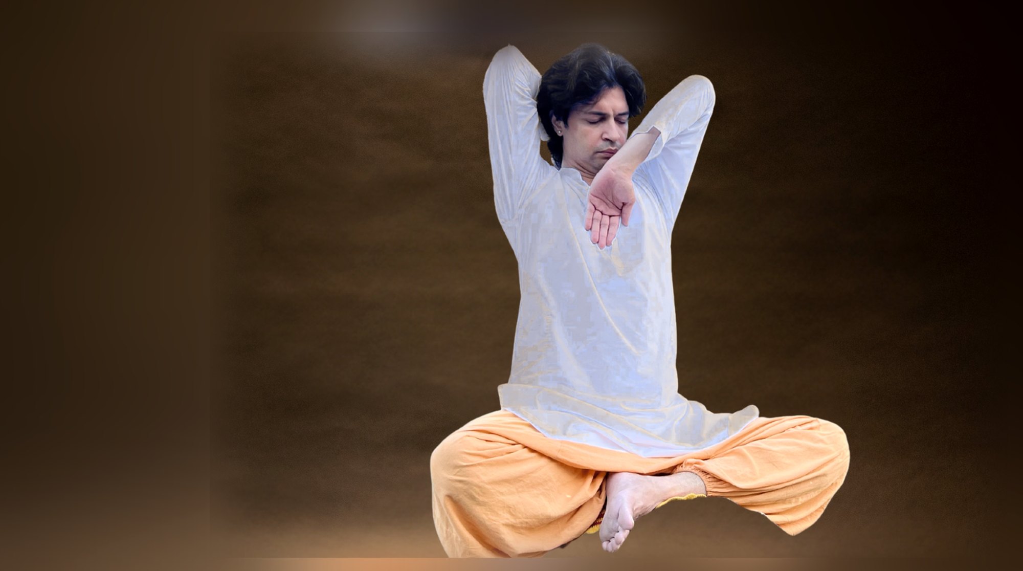 A student in a standing posture during the Lāghavam programme